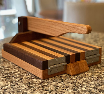 reviewer photo of the wooden cutting board on a counter