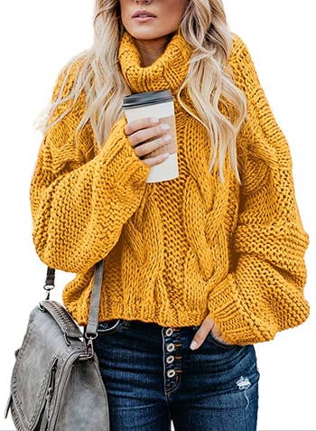 Model wearing the sweater in yellow