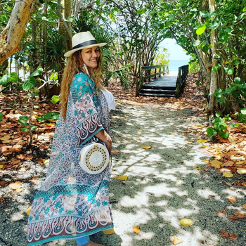 Reviewer wearing floral coverup