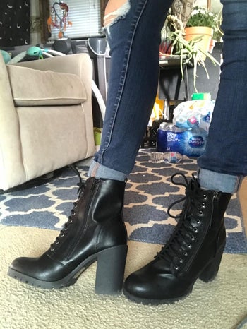 reviewer photo of them wearing black combat boot heels