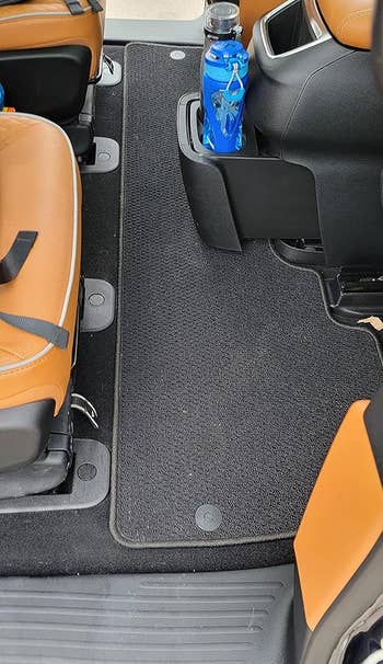 The same reviewer's backseat floor completely sand-free after using the vacuum 