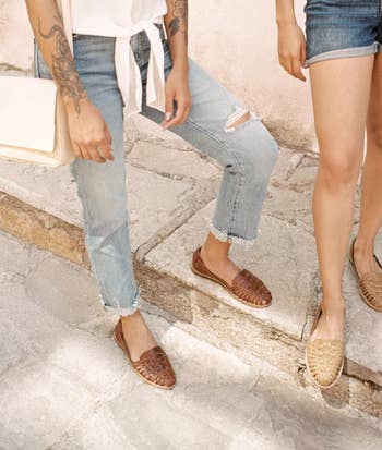 two models wearing the huaraches in different shades of brown