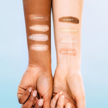 the four shades swatched on models' arms