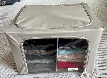 a reviewer's cube storage with zipper on top and the sided