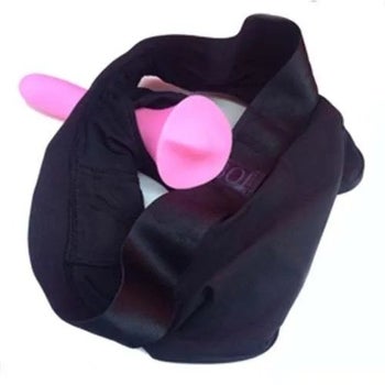 Pink dildo in black harness briefs