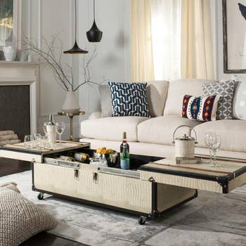 coffee table extended trays, wine inside