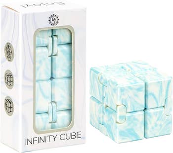 a blue and white marbled infinity cube