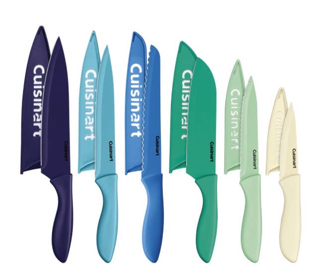 A set of differently sized knives in hues of blues, greens, and off-white