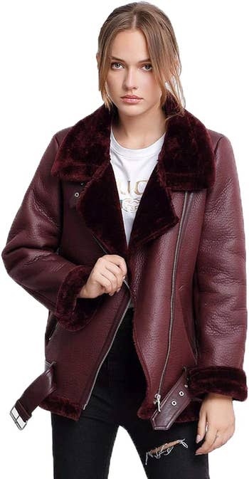 model wearing the coat in wine red