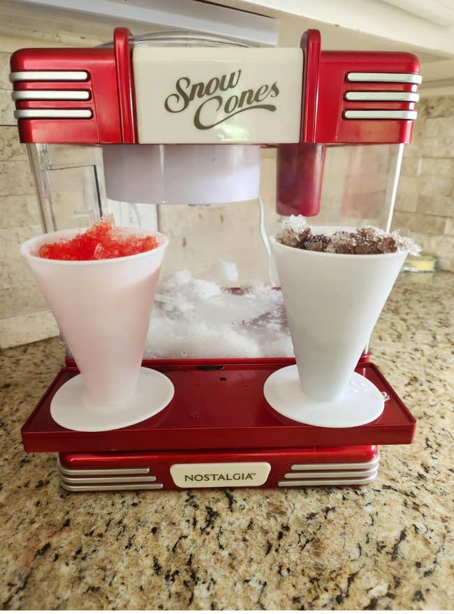 Nostalgia snowfall cone shaper connected a antagonistic with 2 cones; 1 reddish and 1 brown