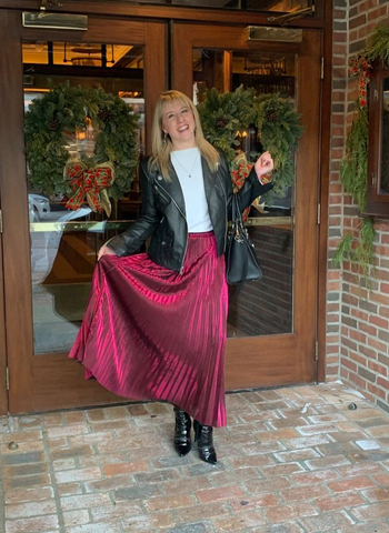 Reviewer wearing the pink metallic skirt