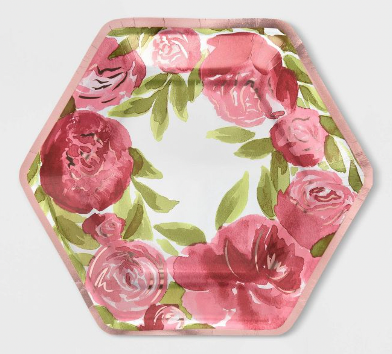 a paper plate with pink flowers and green leaves on them