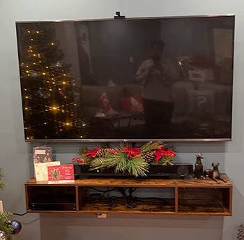 Reviewer image of brown TV stand