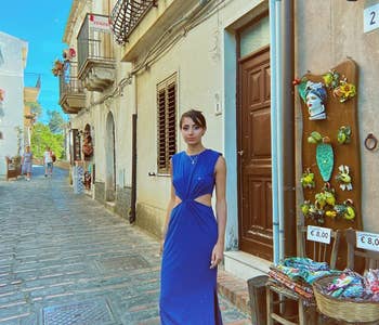 image of another reviewer wearing the navy cut out maxi dress