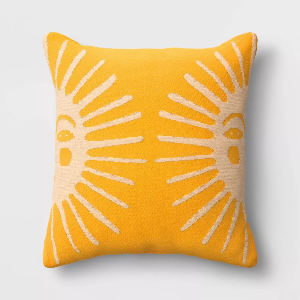 The pillow with a sun pattern
