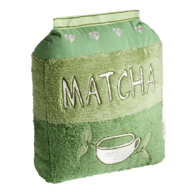 Matcha-themed plush pillow with bosom  accents and a teacup illustration, cleanable   for beverage  lovers' location  decor