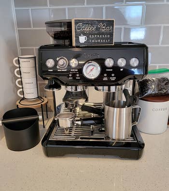 reviewer's espresso machine in black