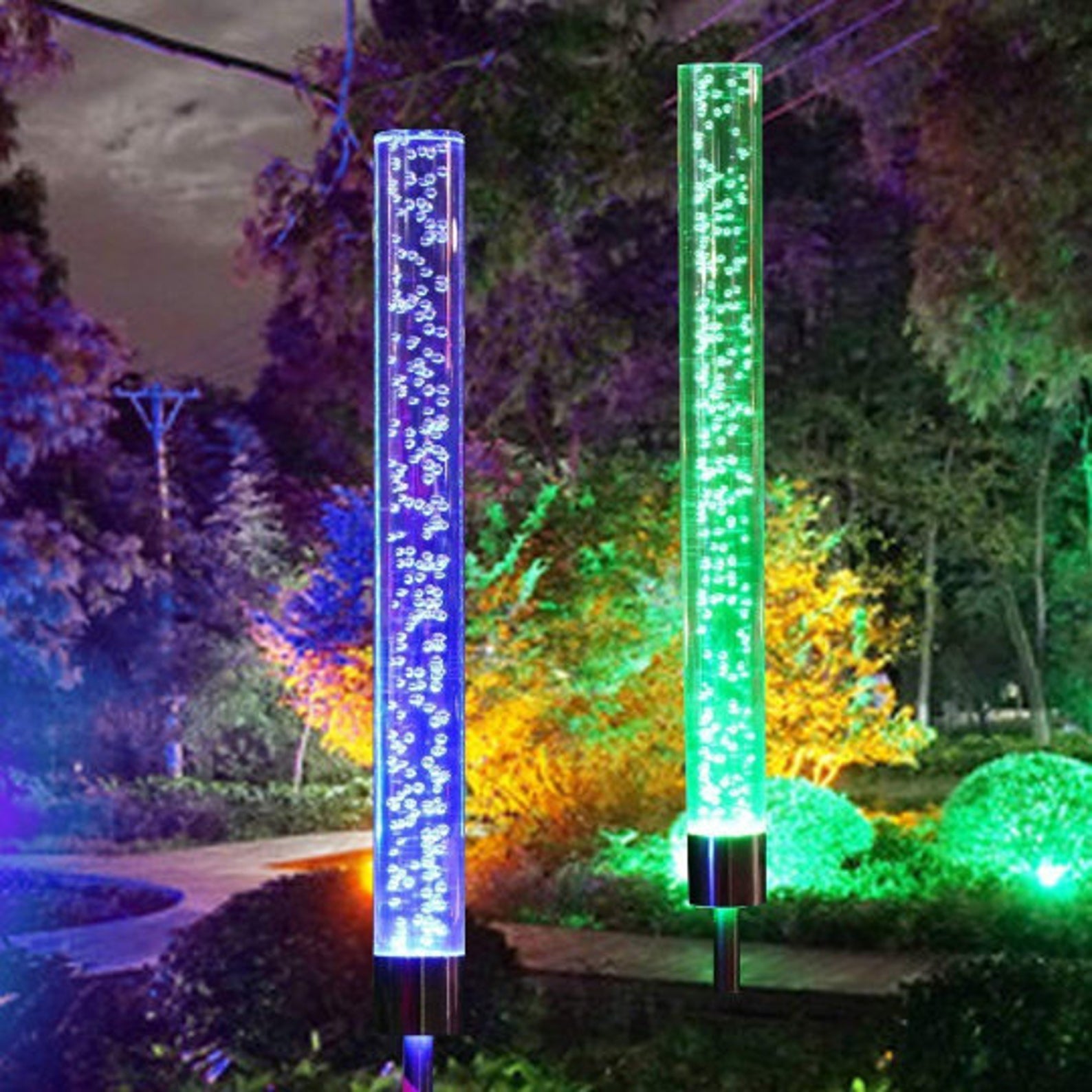 Solar powered bubble lights in different colors lighting up a pathway