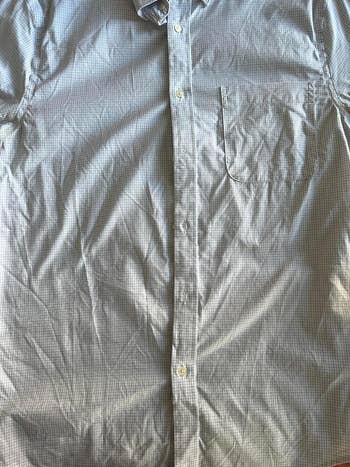 before image of a wrinkled button-up shirt