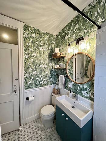 a bath  decorated with the thenar  leafage  wallpaper