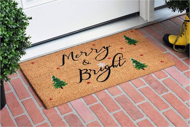 a doormat that says 