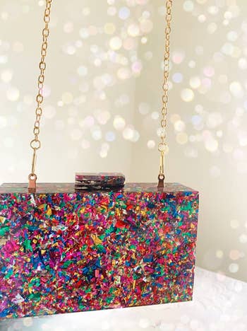 reviewer photo of the multicolored clutch