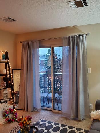 curtains hung in a cozy looking living room using the nono brackets