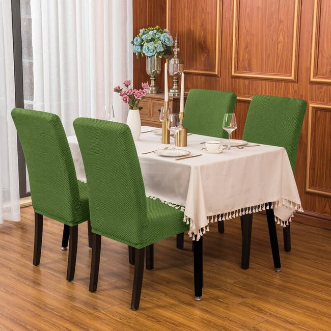 dining chairs with green slipcovers