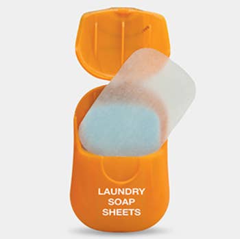 the orange container of laundry soap sheets