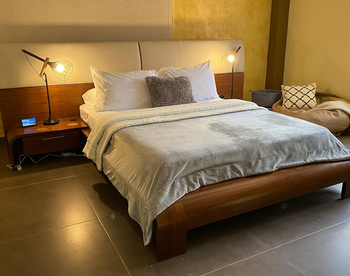 white sheet set on a reviewer's bed