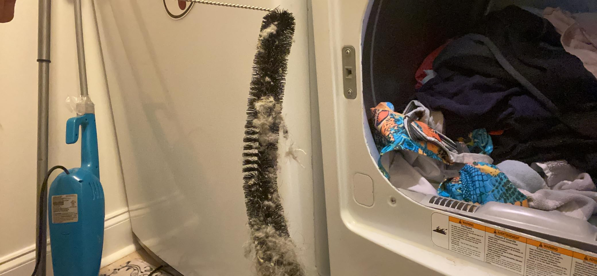 Lint buildup successful  a dryer vent adjacent  to laundry essentials, highlighting a imaginable   occurrence  hazard successful  location  appliances