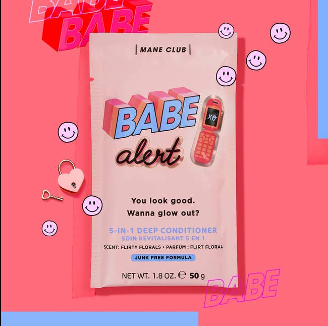 The mask product in a pink pouch 