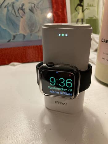 a reviewer's watch on the charger