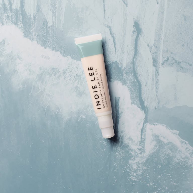 the bottle of gel laying on a table