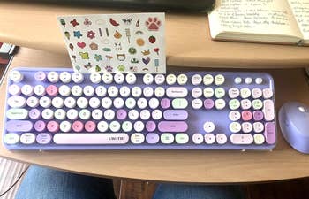 reviewer photo of the keyboard in purple