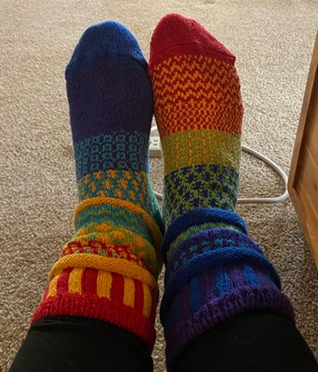 Image of reviewer wearing colorful socks