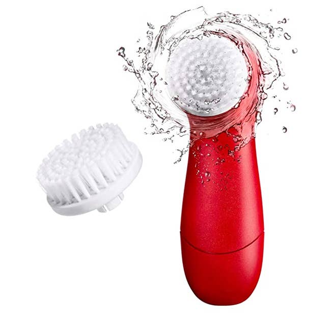 a red sonic brush spinning with water splashing off of it with a white brush head next to it