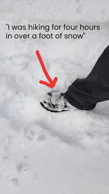 A close-up of a person's snow-covered boot in deep snow with an arrow pointing to it and text stating, 