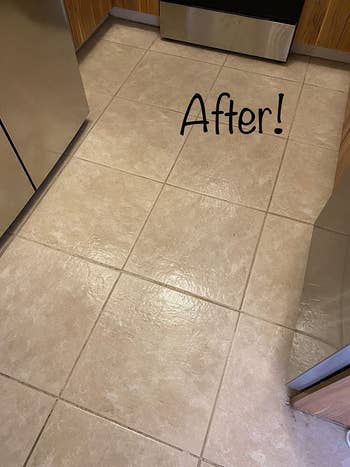 A reviewer's tiled floors after being cleaned by the steam mop and looking super clean