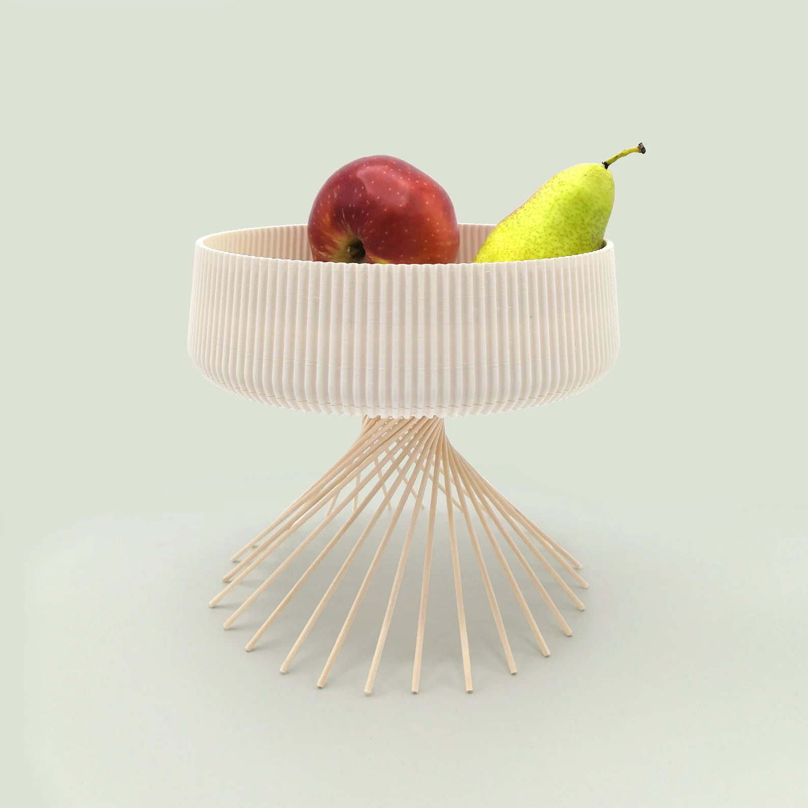 a 3D printed fruit bowl holding fruit