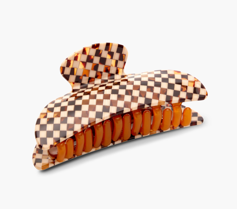 a claw clip with a tortoise shell checkered pattern