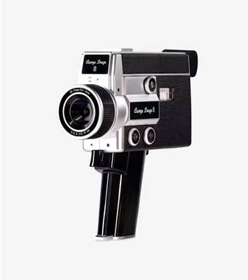 A vintage film camera with a sleek black and silver design, featuring a prominent lens and ergonomic grip, ideal for retro enthusiasts