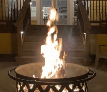 reviewer gif of the fire pit lit up at night