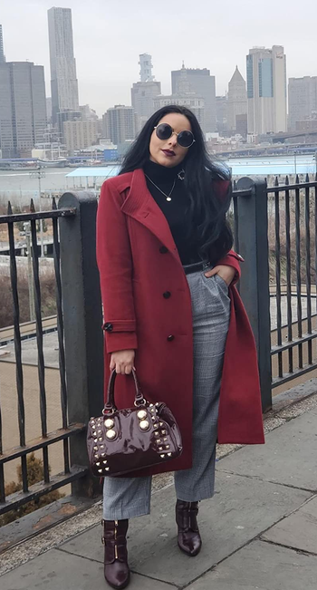 Reviewer wearing the coat in red