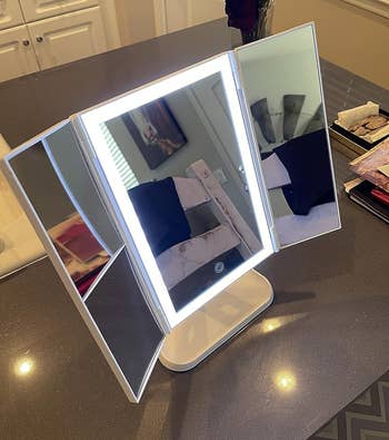 reviewer image of the mirror opened up with the lights on
