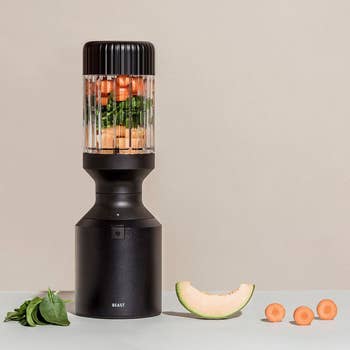 black beast blender with fruits and veggies