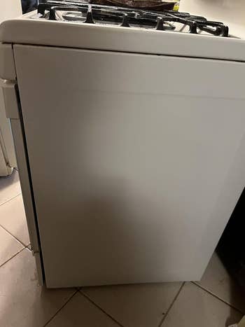 Side presumption of a freestanding room stove connected a tiled floor, showing its beforehand and apical surfaces