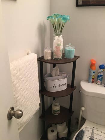 reviewer image of the corner display in a bathroom