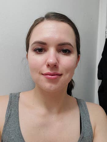 another reviewer wearing the eyeshadow primer with blush-color eyeshadow and eyeliner