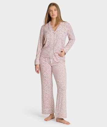 Person wearing patterned pajama acceptable   featuring long-sleeved apical  and pants, suitable for a comfy  and stylish sleepwear look